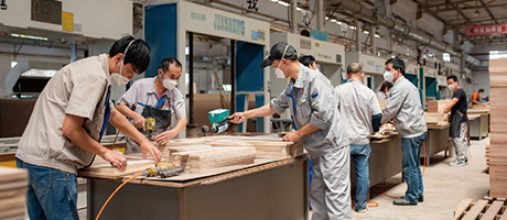 Custom hotel furniture factory with advanced production equipment and modern workshop environment